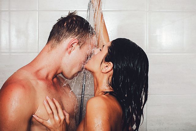 couple having incredible sex in the shower